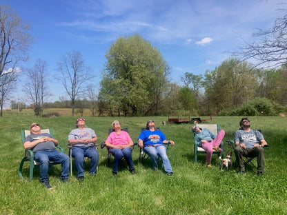 Group viewing a solar eclipse with Tember glasses
